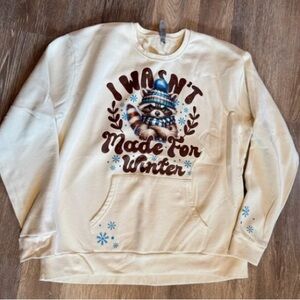 Cozy Cream Crewneck Sweater with Winter Graphic